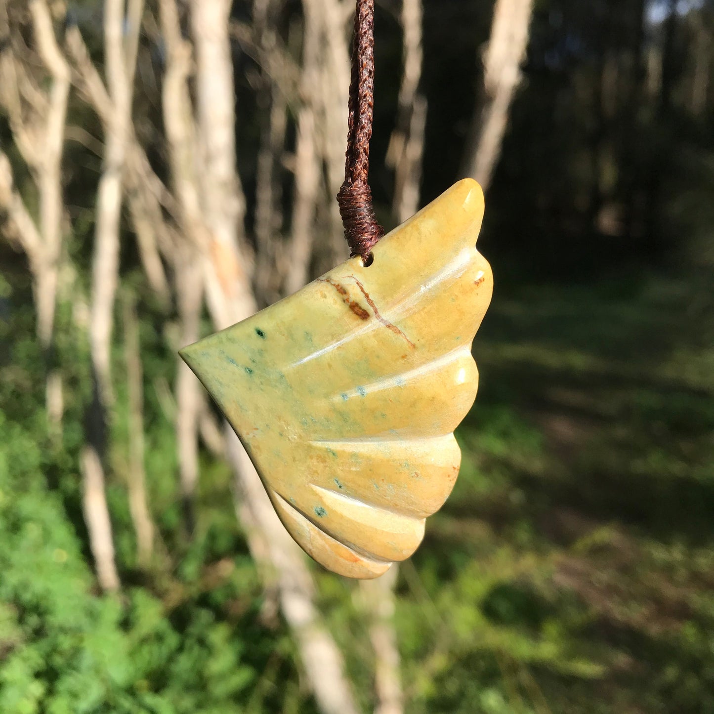 'Wing in flight' (New Zealand flower jade) Pendant