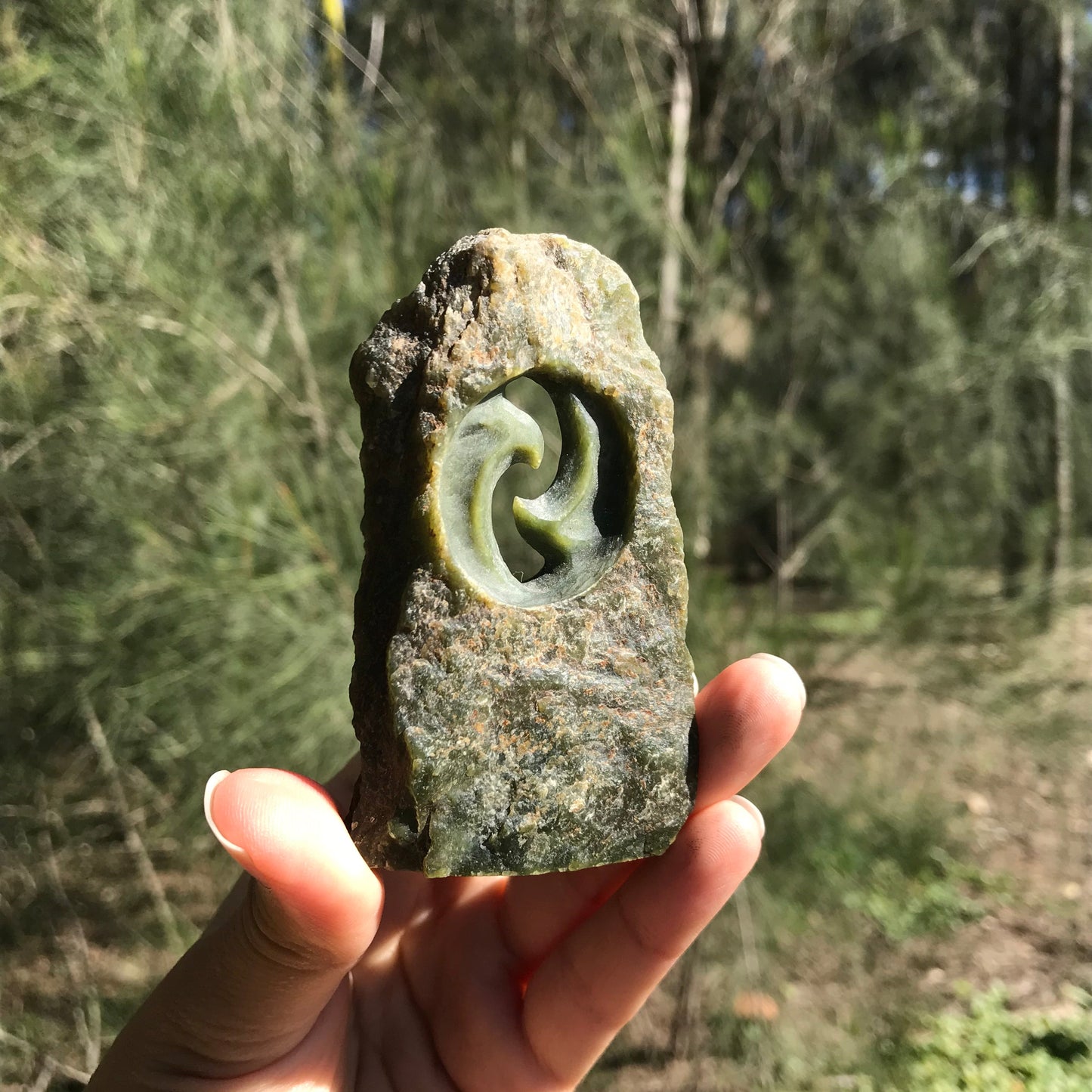 Carved paperweight (Canadian jade)