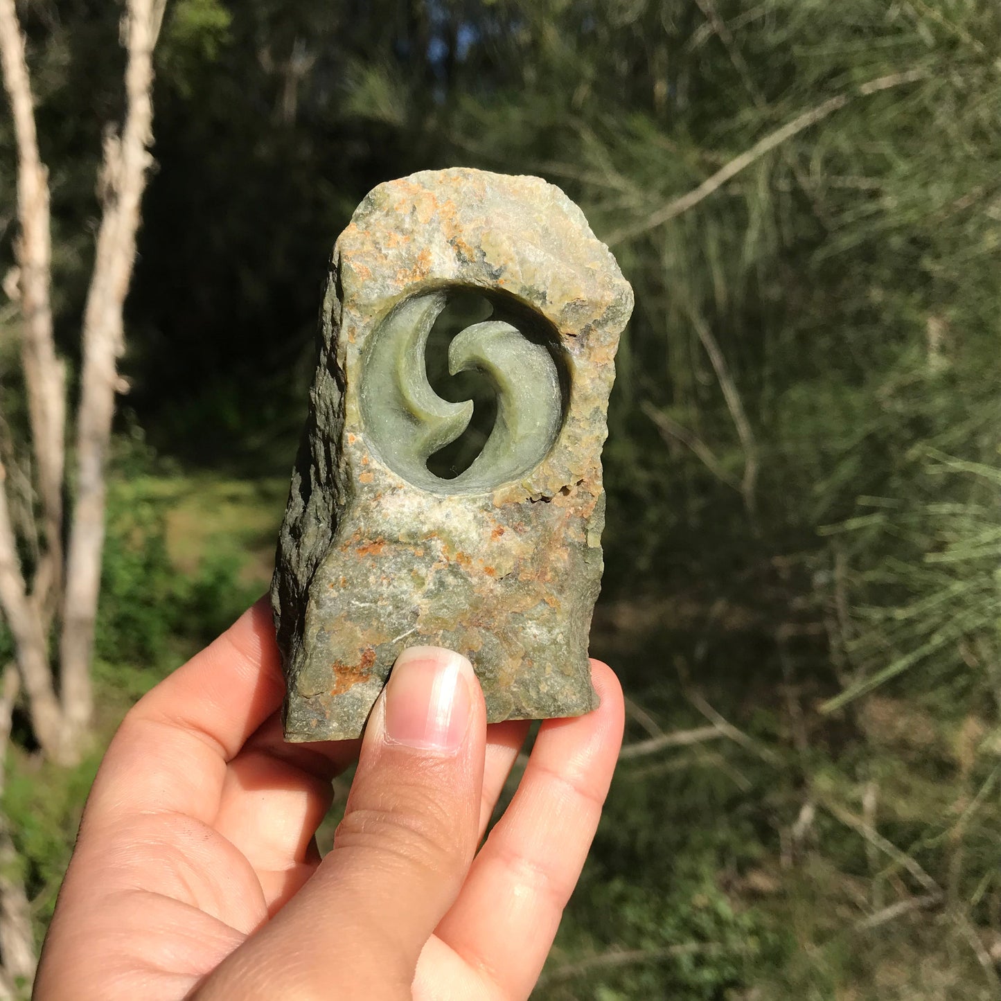 Carved paperweight (Canadian jade)